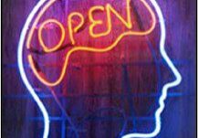 Picture1 A neon sign of an open mind with the word " open ".